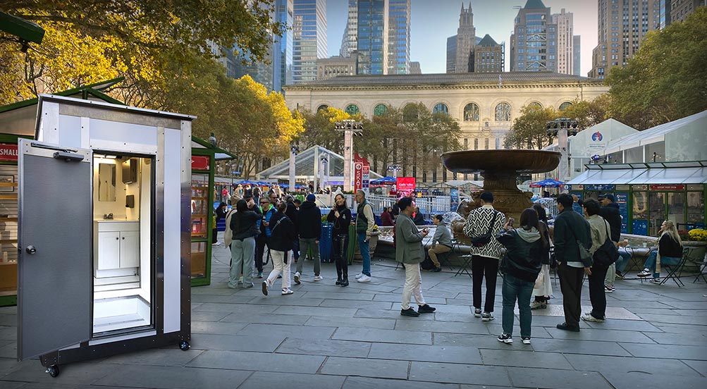 White Wash Portable Restroom | Green Colored White Wash Portable Restroom Inside an Underground Tunnel