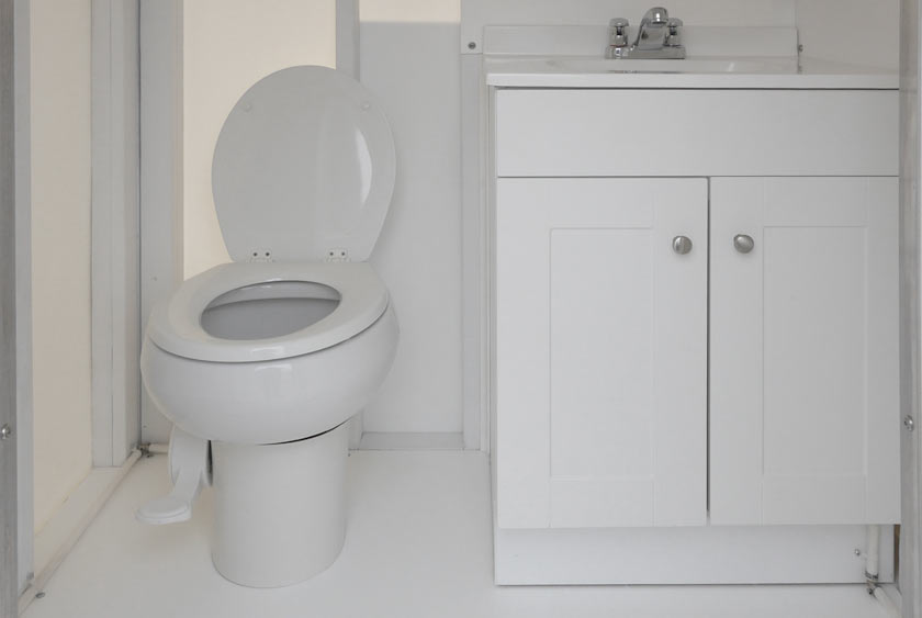 FULL SIZED PORCELAIN TOILET WITH foot-pedal for hands-free flushing