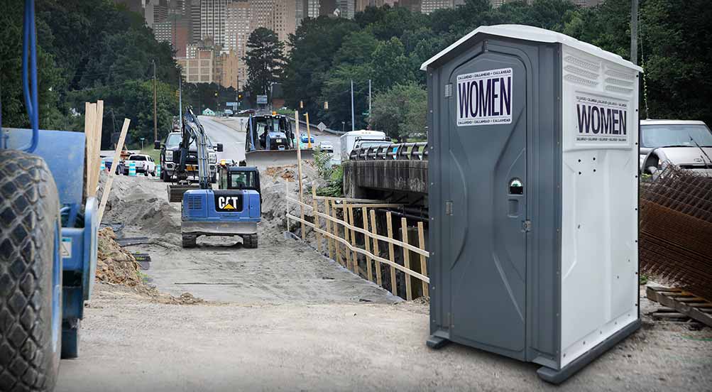 The Women’s Head Portable Toilet Near Road Work